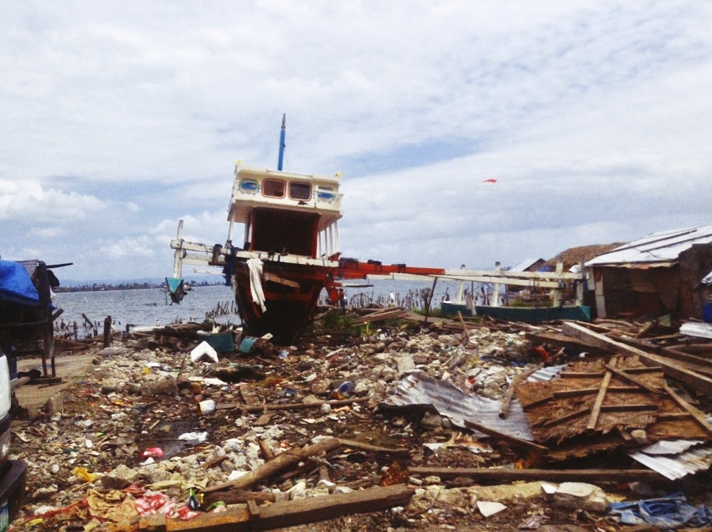 fishing boat thrust inland due to the storm surge after typhoon yolanda