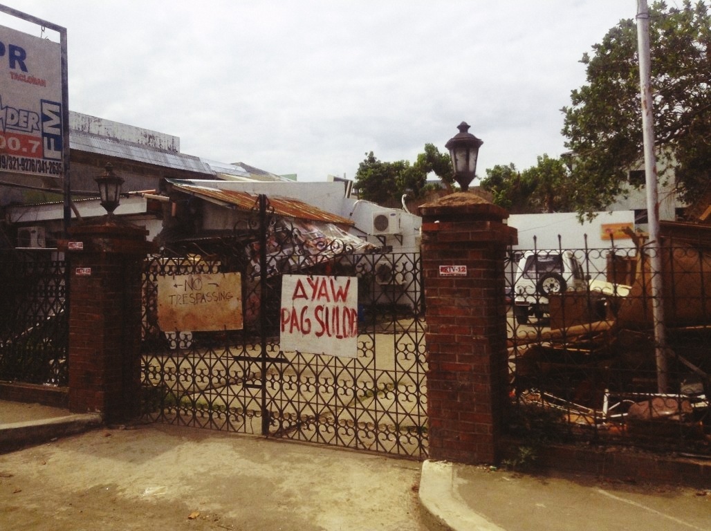 warning sign in tacloban city after typhoon yolanda